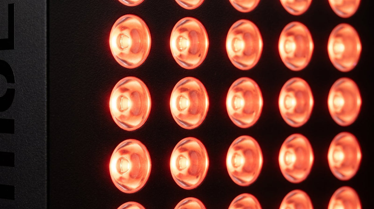 Close-up of red light therapy LEDs glowing