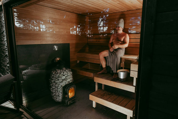 Man relaxing in the heat of a sauna
